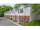 Charming townhomes featuring a brick and vinyl exterior in a well-maintained community at 241 Howle Ave # H, Charleston, SC 29412