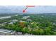 Drone view of real estate location near downtown and a scenic body of water at 241 Howle Ave # H, Charleston, SC 29412