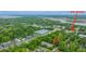 Aerial view of the property with lush greenery, river access and nearby shopping at 241 Howle Ave # H, Charleston, SC 29412