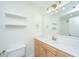 Well-lit bathroom with a modern vanity, ample counter space, and convenient storage at 241 Howle Ave # H, Charleston, SC 29412