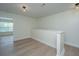 Versatile bonus room with natural light, perfect for a home office, play area, or lounge at 241 Howle Ave # H, Charleston, SC 29412