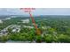 Aerial view showing the property's location surrounded by lush greenery near the water at 241 Howle Ave # H, Charleston, SC 29412