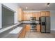 Well-equipped kitchen featuring stainless steel appliances and ample cabinet space at 241 Howle Ave # H, Charleston, SC 29412