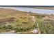 Community aerial view showcasing a walking trail, dock, pavilion, and marsh views at 2729 Battery Pringle Dr, Johns Island, SC 29455