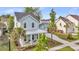Charming curb appeal with palm trees lining the drive, leading to a well-maintained home and detached garage at 2729 Battery Pringle Dr, Johns Island, SC 29455