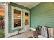 Charming outdoor patio with comfortable seating, string lights, and a view of the landscaped backyard at 2729 Battery Pringle Dr, Johns Island, SC 29455