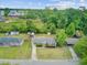An aerial view showcases a home with blue shutters, well-maintained yard, and neighborhood amenities at 296 Oxford Rd, Ladson, SC 29456