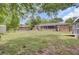 Spacious backyard showcasing a combination of a shed, porch and landscaping potential for your enjoyment and customization at 296 Oxford Rd, Ladson, SC 29456