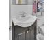 Bright bathroom with a classic sink and vanity, next to the toilet and shower at 296 Oxford Rd, Ladson, SC 29456