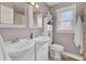 Charming bathroom featuring double sinks and a window for natural light at 296 Oxford Rd, Ladson, SC 29456