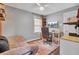 Modern bedroom with desk space, a ceiling fan, and ample natural light at 296 Oxford Rd, Ladson, SC 29456