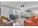 Bright living room with modern decor, a colorful rug, and comfortable seating at 296 Oxford Rd, Ladson, SC 29456