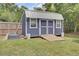 Backyard storage shed with ramp access and double doors, providing ample space for your tools and equipment at 296 Oxford Rd, Ladson, SC 29456