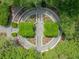 Aerial view of a meticulously designed garden with symmetrical pathways, trimmed hedges, and artful landscaping at 2970 Roseville Rd, Wadmalaw Island, SC 29487