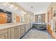 Luxurious bathroom with double vanities, soaking tub, and elegant tile work at 2970 Roseville Rd, Wadmalaw Island, SC 29487