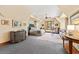 Spacious main bedroom with a sitting area, elegant decor, and lots of natural light at 2970 Roseville Rd, Wadmalaw Island, SC 29487