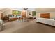 Large bedroom with four beds, neutral carpet and paint, and plenty of room to relax at 2970 Roseville Rd, Wadmalaw Island, SC 29487
