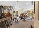 Large home exercise room with natural light and comprehensive workout equipment at 2970 Roseville Rd, Wadmalaw Island, SC 29487