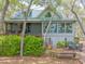 Beautiful home featuring a spacious deck perfect for outdoor dining at 2970 Roseville Rd, Wadmalaw Island, SC 29487