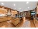 Spacious kitchen featuring an island with seating and lots of natural light at 2970 Roseville Rd, Wadmalaw Island, SC 29487