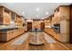Spacious kitchen featuring custom cabinets and stainless steel appliances at 2970 Roseville Rd, Wadmalaw Island, SC 29487