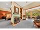 Sitting area with a fireplace and a view into the bedroom at 2970 Roseville Rd, Wadmalaw Island, SC 29487