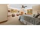 Spacious main bedroom boasts natural light, neutral walls, and carpet flooring at 2970 Roseville Rd, Wadmalaw Island, SC 29487