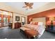 Stylish main bedroom with en suite bathroom, vibrant accents and furnishings at 2970 Roseville Rd, Wadmalaw Island, SC 29487