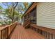 Inviting porch featuring wood floors, ceiling fans, and a beautiful view of the surrounding trees at 2970 Roseville Rd, Wadmalaw Island, SC 29487