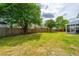 Large backyard featuring a manicured lawn, a wooden fence and a wooden pergola at 315 Courtney Round, Summerville, SC 29486