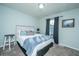 This is a bedroom with simple decor and good natural light at 315 Courtney Round, Summerville, SC 29486