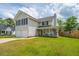 Charming two-story home featuring a spacious front yard and a two-car garage at 315 Courtney Round, Summerville, SC 29486