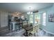 Eat-in kitchen with stainless steel appliances, a breakfast bar, and a charming dining area at 315 Courtney Round, Summerville, SC 29486