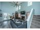 Bright living room with a fireplace, soaring ceilings, and large windows at 315 Courtney Round, Summerville, SC 29486