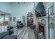 Comfortable living room with a fireplace, plush seating, and access to the backyard at 315 Courtney Round, Summerville, SC 29486