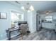 Bright office area featuring a modern desk, natural light from a window, and direct access to the kitchen at 315 Courtney Round, Summerville, SC 29486