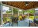 Screened porch with overhead fan featuring an outdoor furniture set and view of the backyard at 315 Courtney Round, Summerville, SC 29486