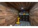 Organized wooden closet with shelving, black storage bins and mosaic patterned flooring offering space for storing goods at 315 Courtney Round, Summerville, SC 29486