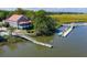 Breathtaking aerial view of a waterfront home with a private dock and scenic surroundings at 33 Duany Rd, Mount Pleasant, SC 29464