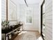Charming entryway featuring shiplap walls, console table, and natural light at 33 Duany Rd, Mount Pleasant, SC 29464