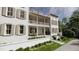 Charming two-story home with a spacious porch, manicured landscaping, and a welcoming curb appeal at 33 Duany Rd, Mount Pleasant, SC 29464