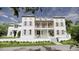 Charming home with a welcoming front porch and lush landscaping, capturing a serene and inviting curb appeal at 33 Duany Rd, Mount Pleasant, SC 29464