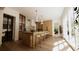 Stunning kitchen with an island, wood cabinetry, seating, and lots of natural light at 33 Duany Rd, Mount Pleasant, SC 29464