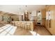 Bright kitchen with bar stool seating at island, wooden floors, and pendant lighting at 33 Duany Rd, Mount Pleasant, SC 29464