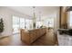Spacious kitchen featuring a large island, wood floors, and stainless appliances at 33 Duany Rd, Mount Pleasant, SC 29464