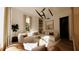 Cozy living room featuring modern lighting, built-in shelving, and a comfortable sectional sofa at 33 Duany Rd, Mount Pleasant, SC 29464