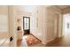 Hallway featuring built-in storage cabinets, shiplap walls, and a decorative area rug at 33 Duany Rd, Mount Pleasant, SC 29464