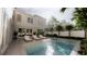 Gorgeous pool with lounge seating surrounded by lush landscaping at 33 Duany Rd, Mount Pleasant, SC 29464