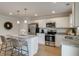 Bright kitchen features stainless steel appliances, granite countertops, and a breakfast bar at 333 O'Leary Circle, Summerville, SC 29483