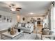 Open-concept living space with a comfortable sofa and seamless flow into the kitchen at 333 O'Leary Circle, Summerville, SC 29483